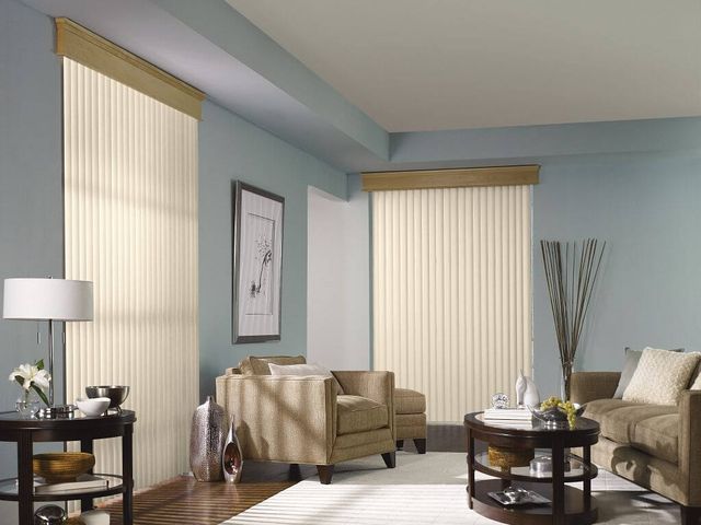 Vertical blinds with a matching valance across a sliding glass door