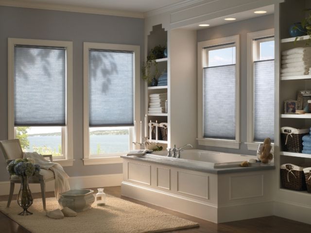 Cordless lift: custom cellular shades by VU Window Treatments in Central Florida