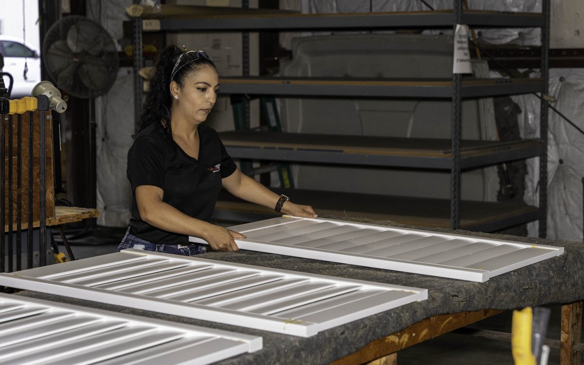 Shutter panels being assembled on the floor of the VU Window Treatments shop in Ocoee